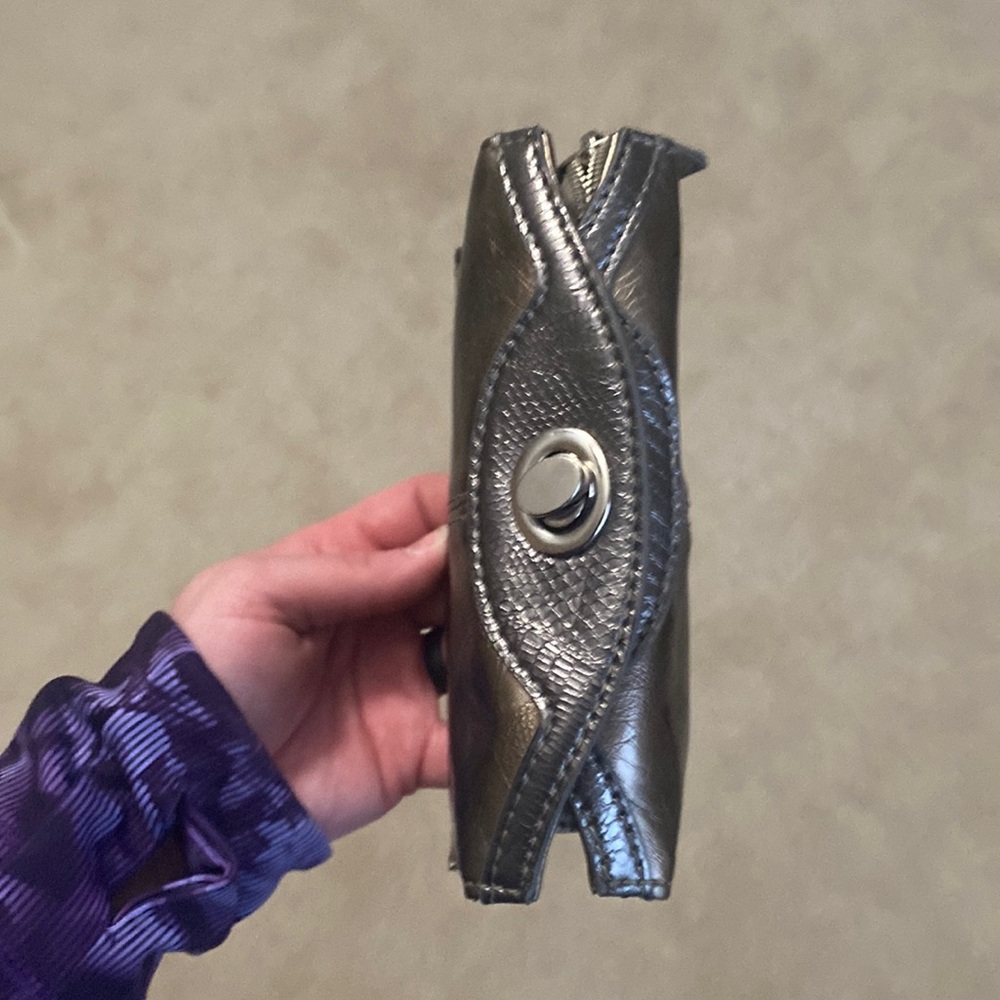 The limited grey/sliver/bronze clutch